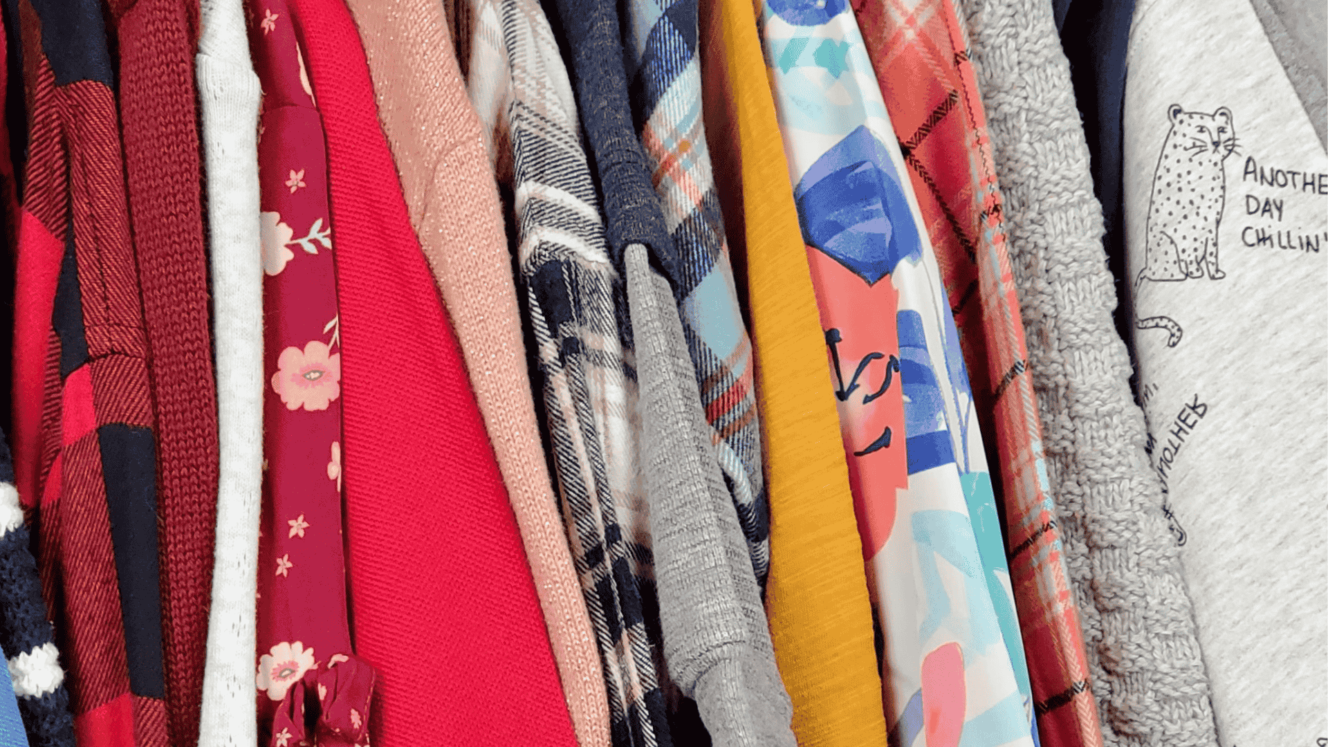 Rack of gently used kids clothes